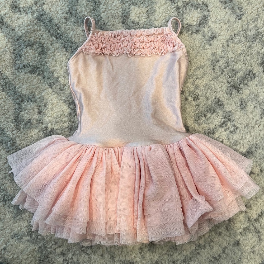 Pink girls leotard with attached tutu
